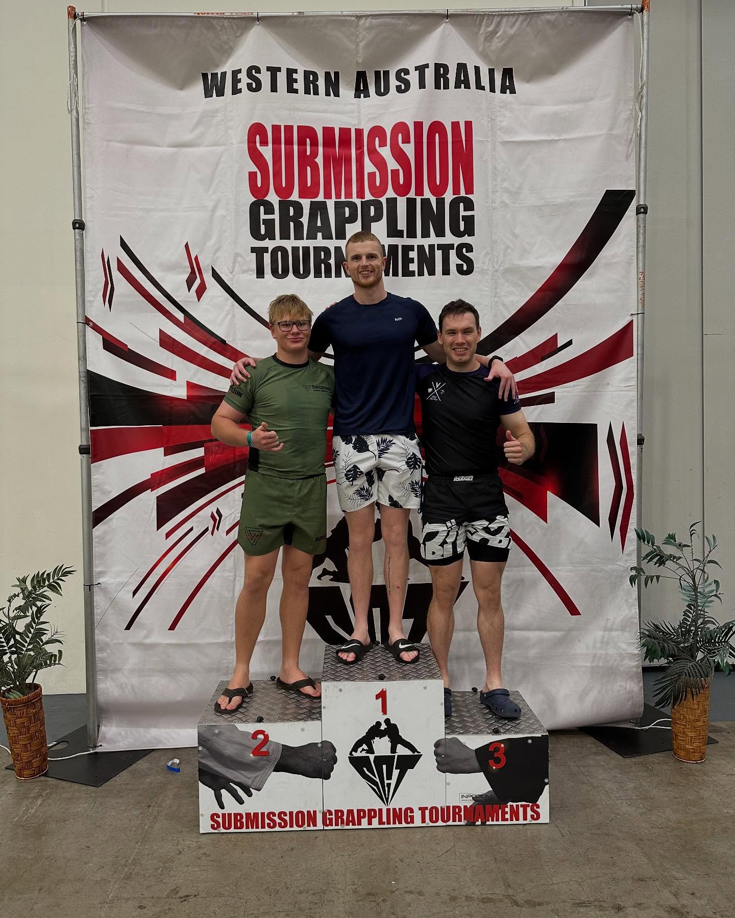 Me on the centre podium at a Brazilian jiu-jitsu competition